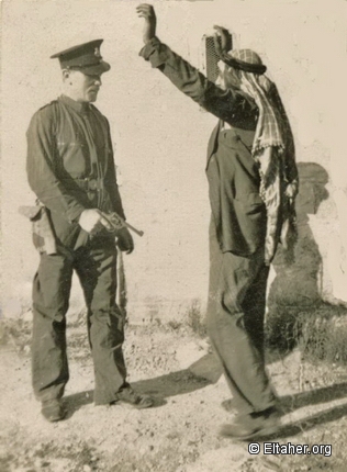 1937 - Palestinian passerby stopped by British soldier